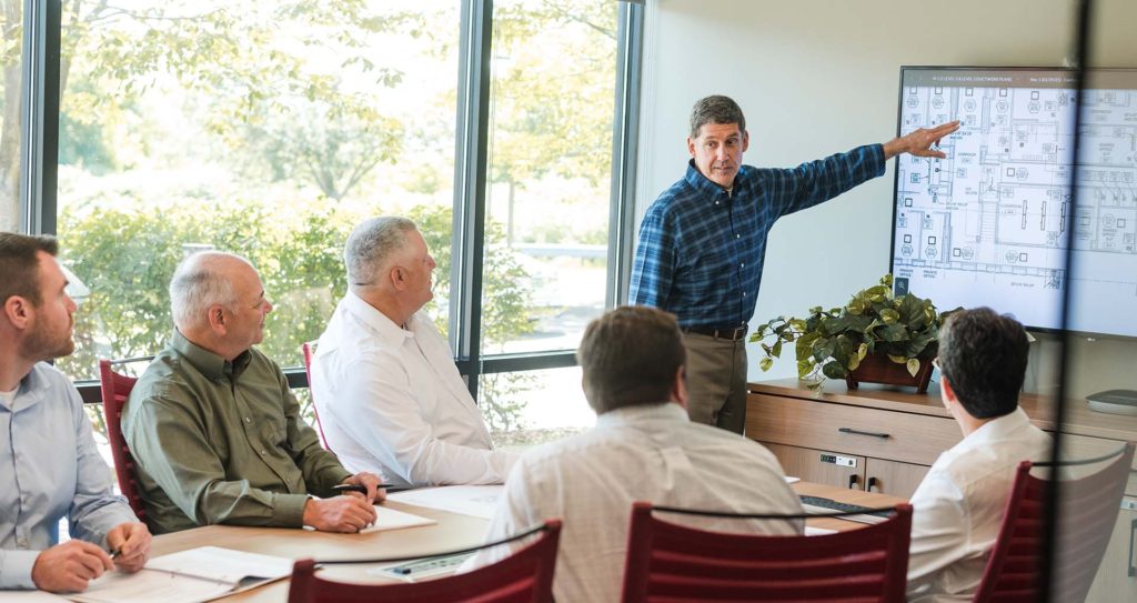 Photo of Engelberth team in conference room